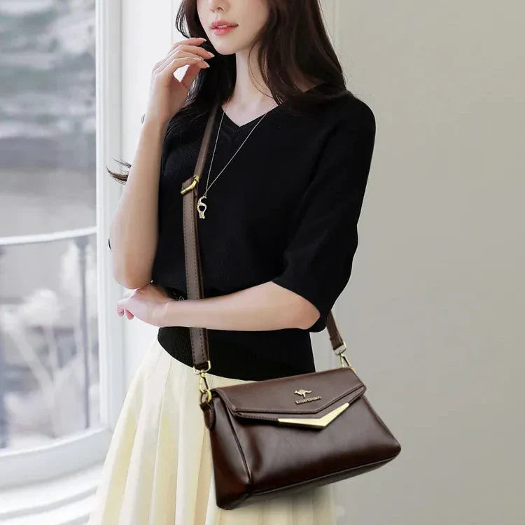 Bolsa em Couro Legítimo - Lona